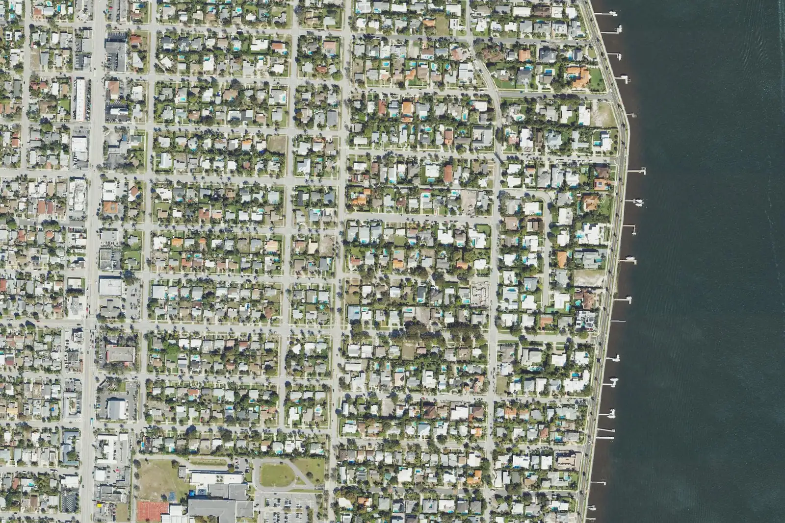 Houses on the South End's grid of streets running down to Flagler Drive and the Lake Worth Lagoon, from above, in West Palm Beach.