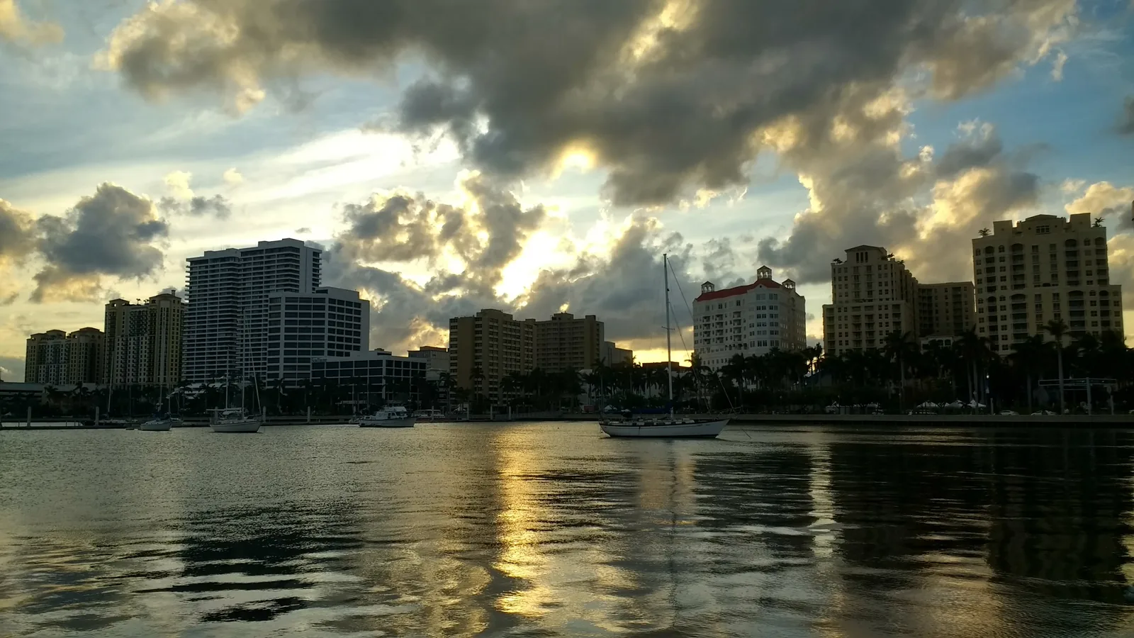 Downtown West Palm Beach at sunset, seen across the Intracoastal Waterway from the docks.