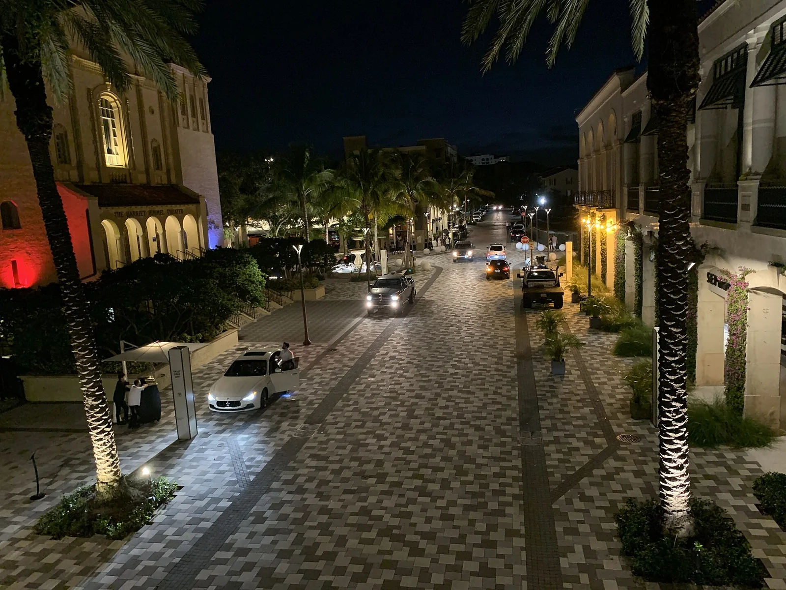Rosemary Avenue at The Square at night, with the Harriet Himmel Theater on the left.