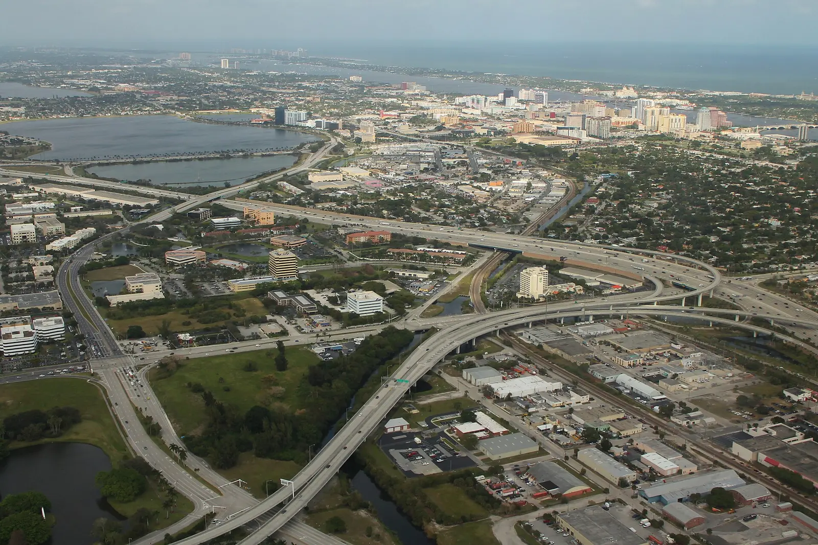 Aerial view of the I-95 interchange at Australian Avenue, with Clear Lake and downtown West Palm Beach beyond.