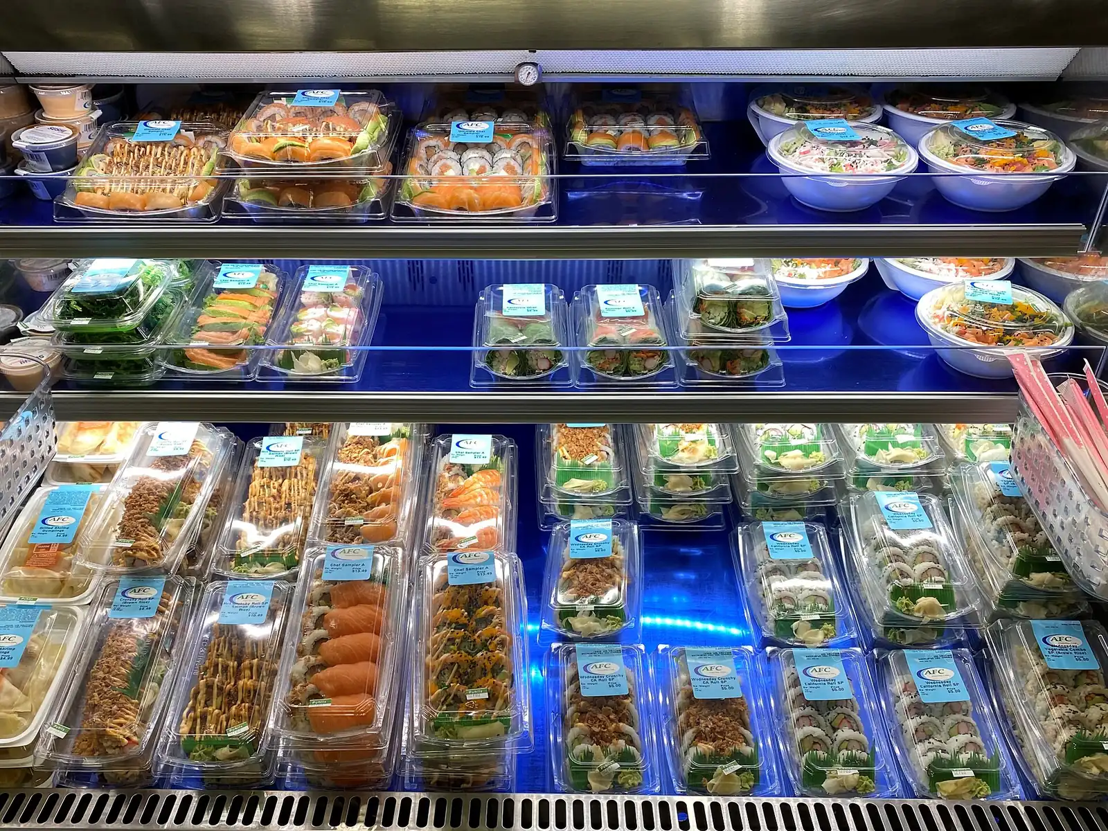 Packaged sushi rolls in a supermarket case in Miami, a store that is not on this list.